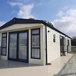 Sunset Retreat Caravan With Large Wrap Around Decking