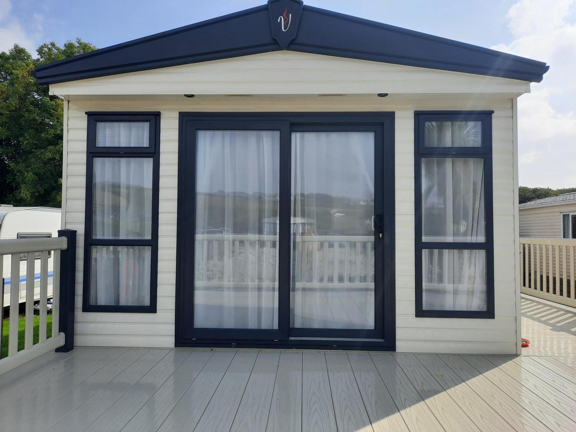 Sunset Retreat Caravan With Large Wrap Around Decking Holiday home *