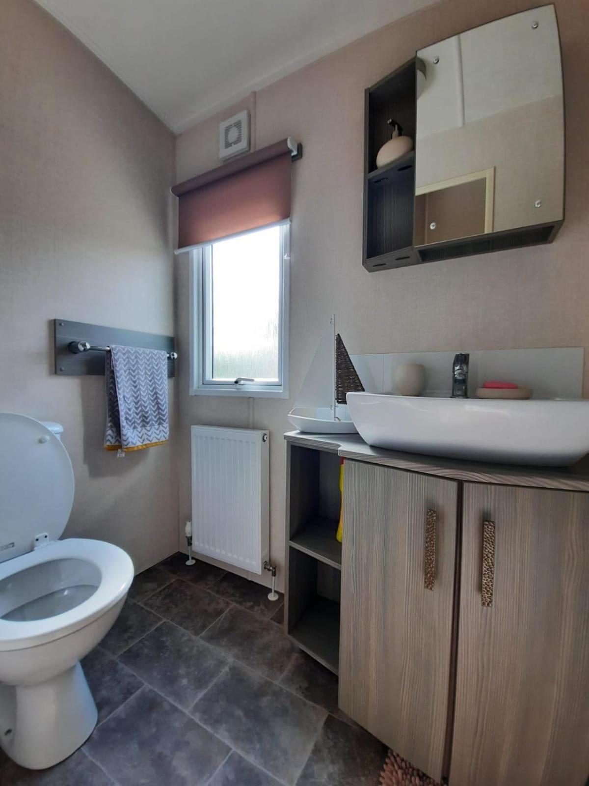 Sunset Retreat Caravan With Large Wrap Around Decking *